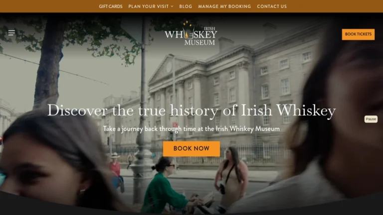 Irish Whiskey Museum entrance in Dublin with visitors exploring the history of Irish whiskey. Book tickets for a tour.